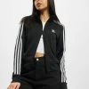 Adidas Originals Damen Übergangsjacke Firebird In Schwarz -Modegeschäft für Damen adidas originals uebergangsjacke schwarz 806190